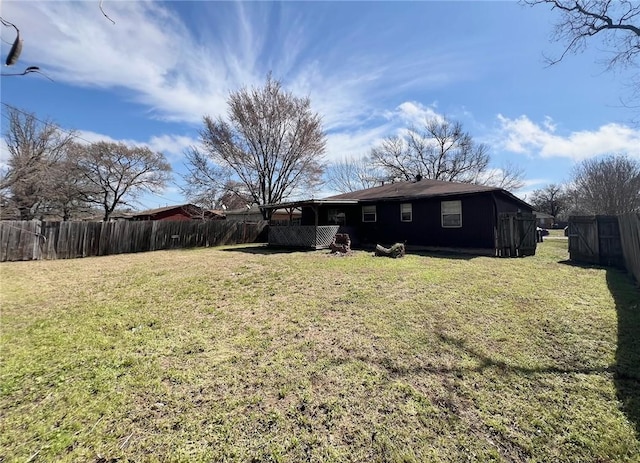 view of yard with a fenced backyard