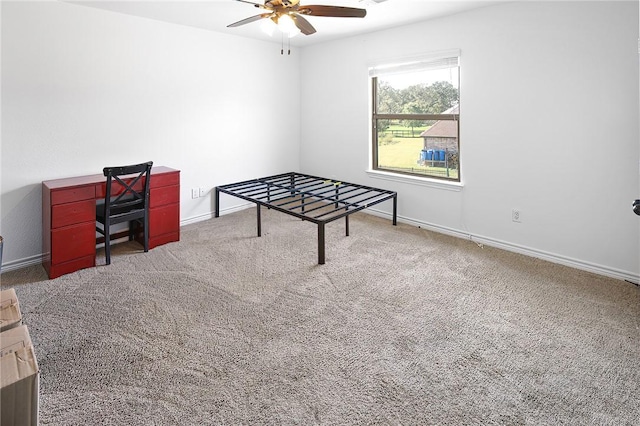 playroom with carpet flooring and ceiling fan