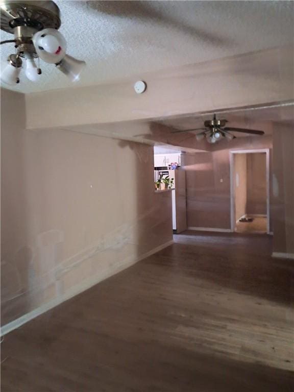1202 Cheyenne Dr, Brenham, TX 77833 - empty room with wood finished floors and a textured ceiling