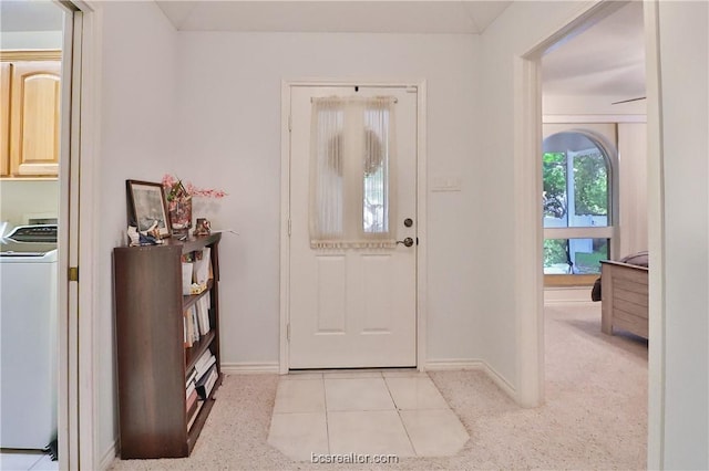 foyer with washer / clothes dryer