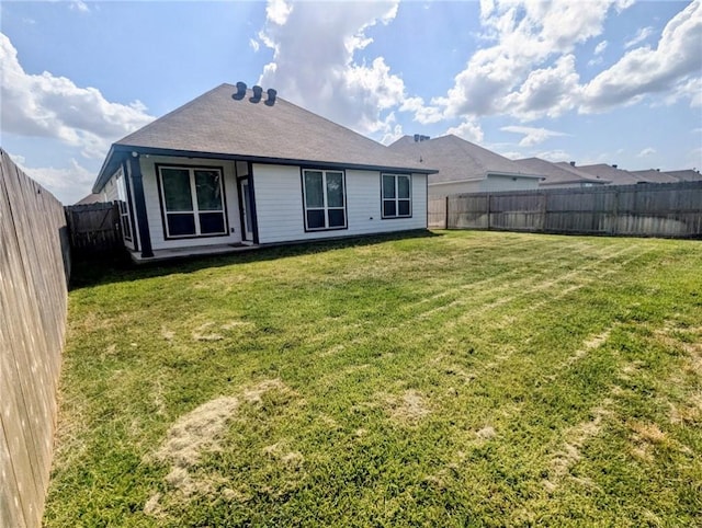 1938 Chief St, Bryan, TX 77807 - back of house featuring a shingled roof