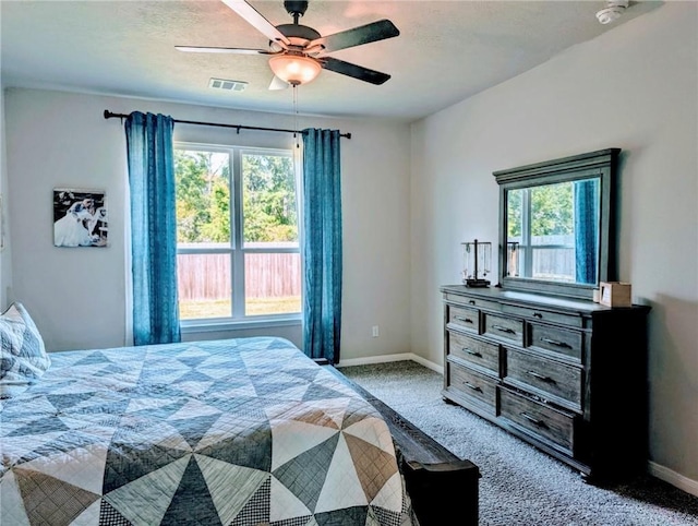 1938 Chief St, Bryan, TX 77807 - carpeted bedroom featuring baseboards and ceiling fan