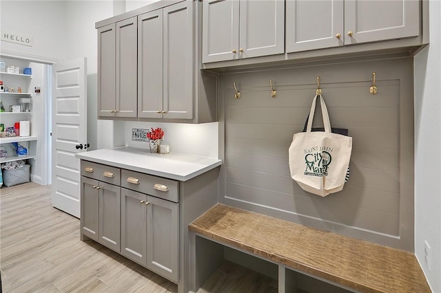 mudroom featuring light wood-style floors