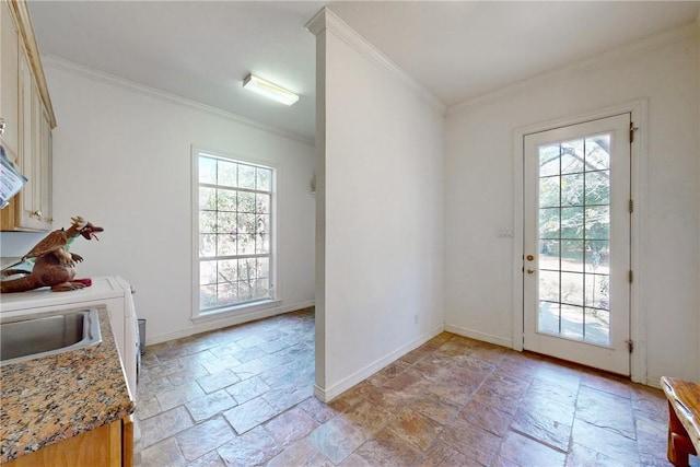 entryway with crown molding and sink