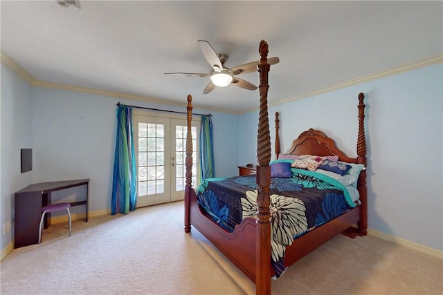 carpeted bedroom featuring ceiling fan, crown molding, and french doors