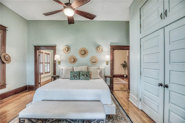 402 Ross St, Brenham, TX 77833 - bedroom with baseboards, light wood finished floors, and ceiling fan