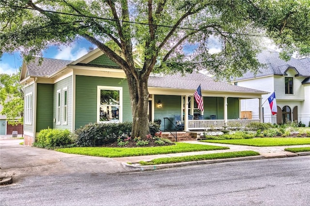 402 Ross St, Brenham, TX 77833 - view of front of property with a porch and a shingled roof