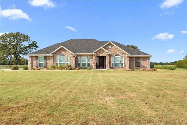 view of front of house with a front lawn