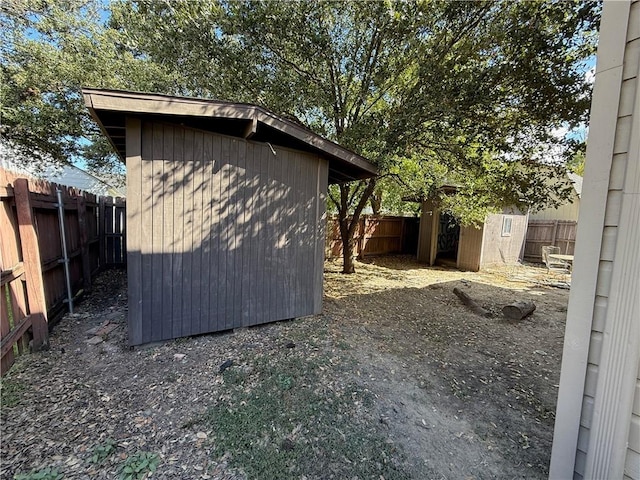 803 Welsh Ave, College Station, TX 77840 - view of shed featuring a fenced backyard