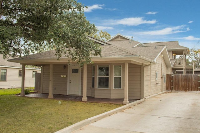 803 Welsh Ave, College Station, TX 77840 - view of front of house featuring a shingled roof, concrete driveway, and a porch