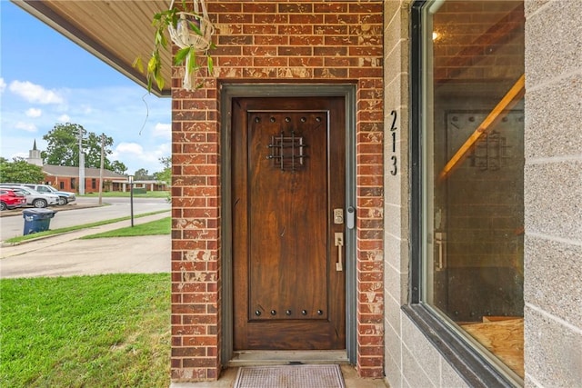213 N Houston Ave, Bryan, TX 77803 - entrance to property featuring brick siding