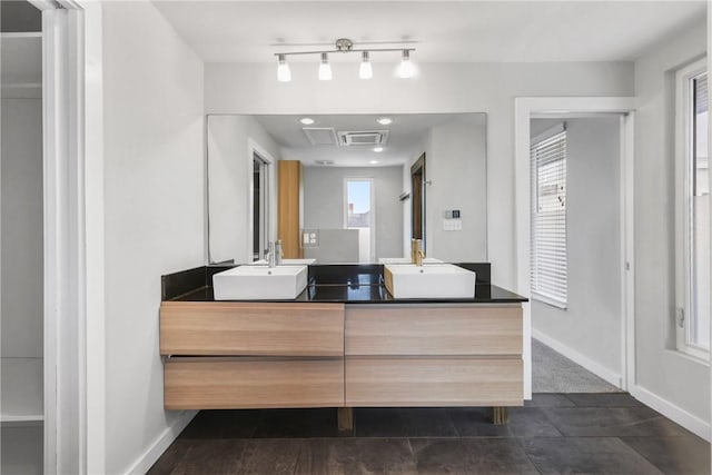 213 N Houston Ave, Bryan, TX 77803 - full bath with double vanity and tile patterned floors