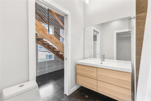 213 N Houston Ave, Bryan, TX 77803 - bathroom with vanity and concrete floors