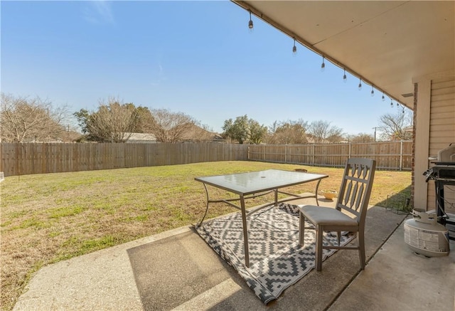 view of patio featuring a fenced backyard