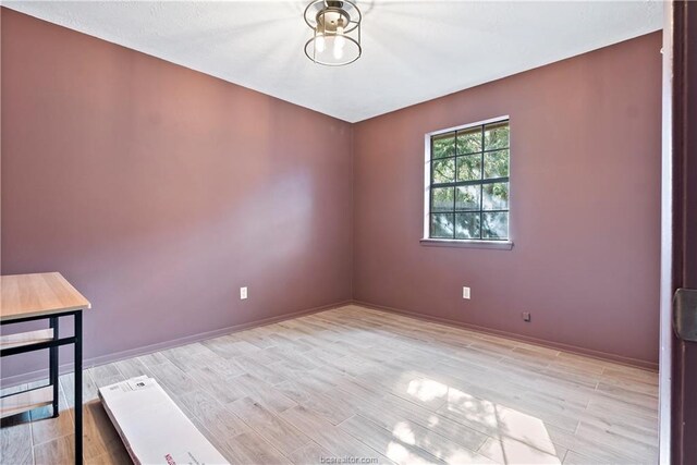 2811 Arroyo Ct N, College Station, TX 77845 - spare room with light wood finished floors and baseboards