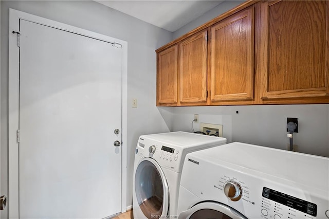 2811 Arroyo Ct N, College Station, TX 77845 - laundry area featuring separate washer and dryer and cabinet space