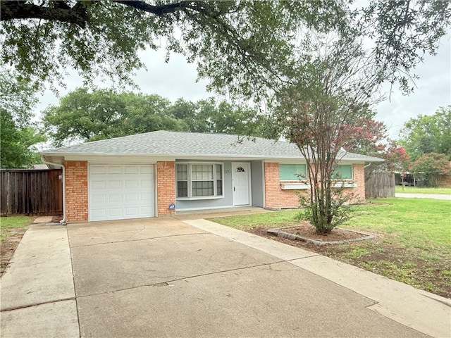 1223 Boswell St, College Station, TX 77840 - ranch-style home featuring an attached garage, concrete driveway, brick siding, and roof with shingles