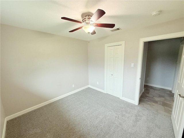 1223 Boswell St, College Station, TX 77840 - unfurnished bedroom with a closet, carpet floors, and ceiling fan