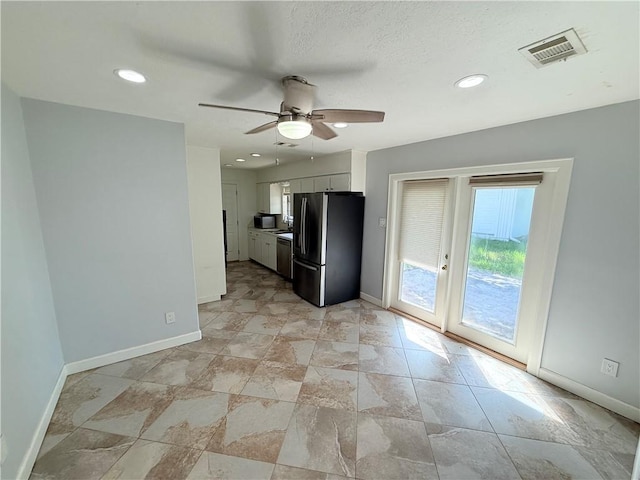 1223 Boswell St, College Station, TX 77840 - kitchen with fridge with ice dispenser, dishwasher, a ceiling fan, white cabinets, and recessed lighting