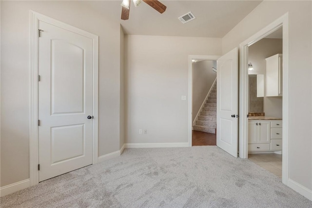 15613 Wood Brook Ln, College Station, TX 77845 - unfurnished bedroom with light colored carpet and connected bathroom