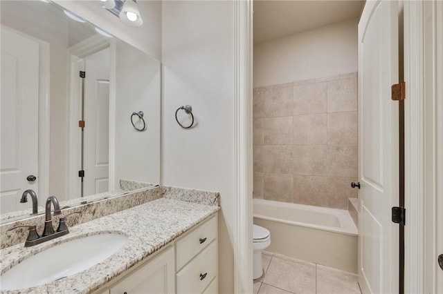 15613 Wood Brook Ln, College Station, TX 77845 - bathroom featuring vanity, tile patterned flooring, and washtub / shower combination