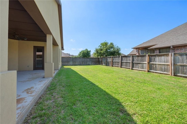 15613 Wood Brook Ln, College Station, TX 77845 - fenced backyard with a patio area