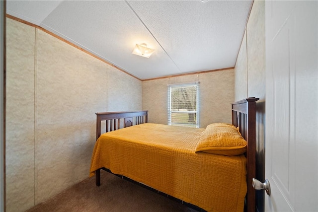 carpeted bedroom featuring crown molding