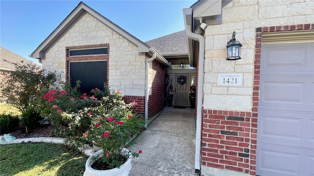 property entrance with a garage