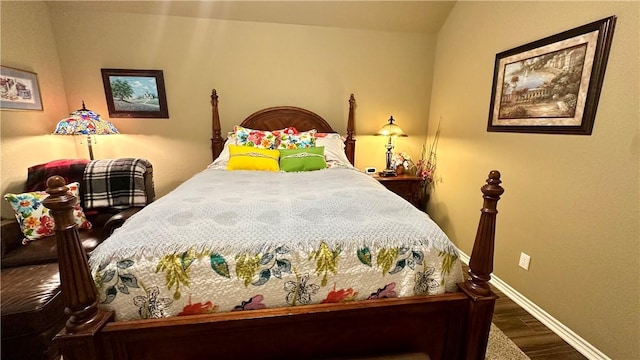 bedroom with wood-type flooring