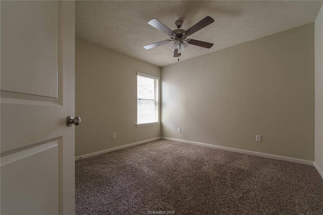 unfurnished room with carpet flooring, baseboards, a ceiling fan, and a textured ceiling