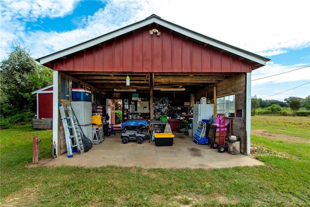 view of outbuilding with a lawn