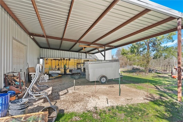 exterior space with a carport