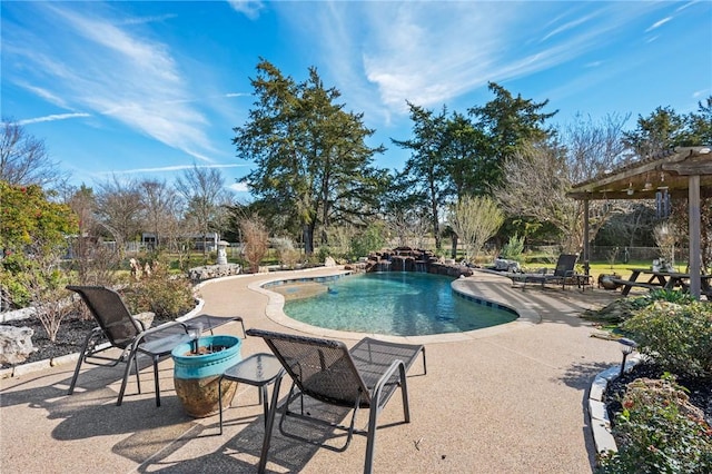 view of swimming pool featuring a patio