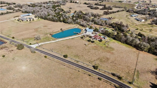 aerial view featuring a water view and a rural view