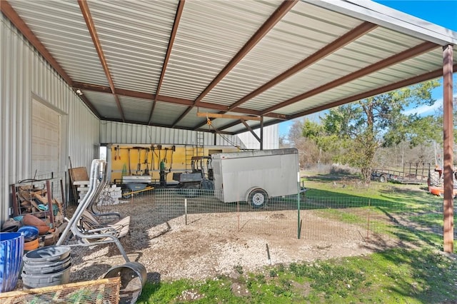 view of patio / terrace with an outbuilding