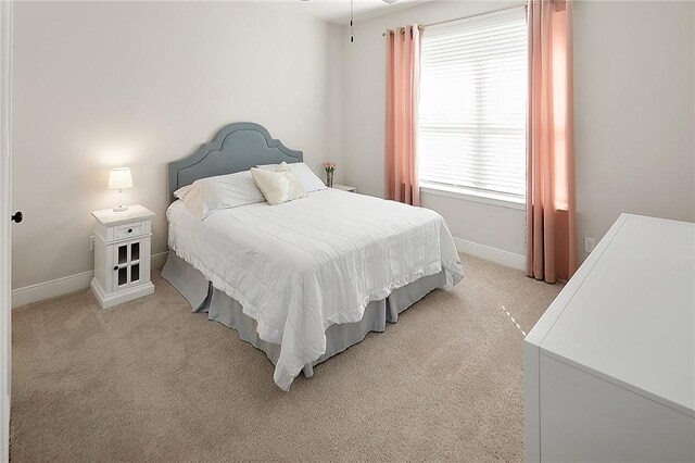 3609 Llano River Dr, College Station, TX 77845 - bedroom featuring light colored carpet and baseboards