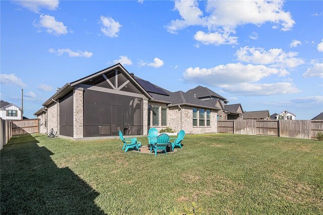 3609 Llano River Dr, College Station, TX 77845 - back of house featuring brick siding and a sunroom