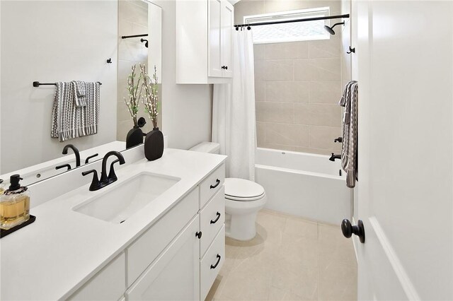 3609 Llano River Dr, College Station, TX 77845 - full bathroom featuring vanity, toilet, shower / bathtub combination with curtain, and tile patterned floors