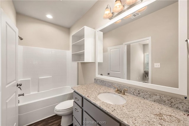 547 Hayes Ln, College Station, TX 77845 - full bathroom featuring vanity, wood finished floors, and shower / tub combination