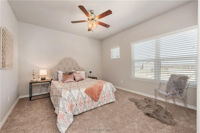 547 Hayes Ln, College Station, TX 77845 - carpeted bedroom featuring baseboards and a ceiling fan