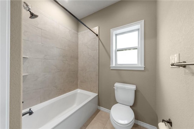 3520 Foxcroft Path, Bryan, TX 77808 - bathroom featuring toilet, bathtub / shower combination, tile patterned floors, and baseboards