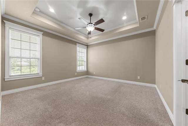 3520 Foxcroft Path, Bryan, TX 77808 - carpeted empty room with ornamental molding, a tray ceiling, a ceiling fan, recessed lighting, and baseboards
