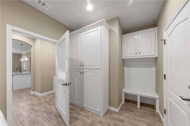 3520 Foxcroft Path, Bryan, TX 77808 - mudroom with baseboards, light wood-type flooring, and recessed lighting