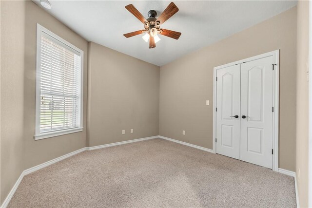 3520 Foxcroft Path, Bryan, TX 77808 - unfurnished bedroom with carpet, baseboards, and a closet
