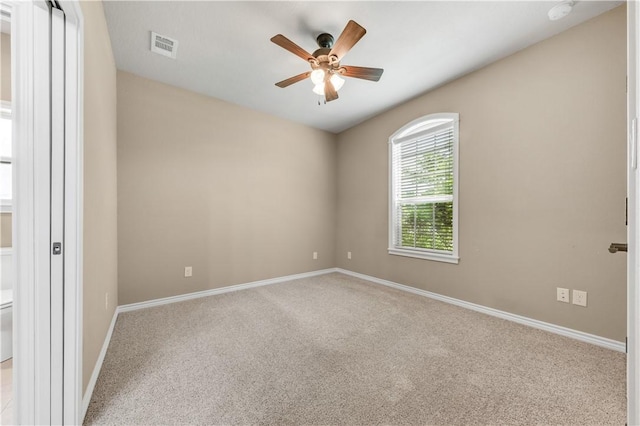 3520 Foxcroft Path, Bryan, TX 77808 - empty room featuring ceiling fan, carpet, baseboards, and a smoke detector