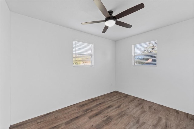 unfurnished room featuring hardwood / wood-style floors and ceiling fan