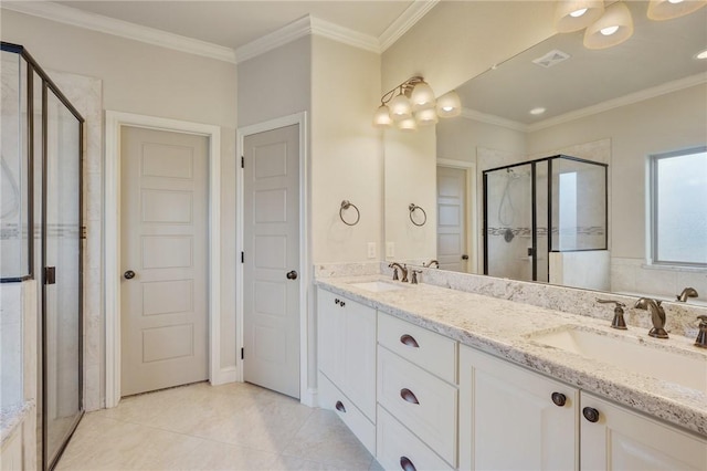 bathroom with tile patterned flooring, vanity, ornamental molding, and walk in shower