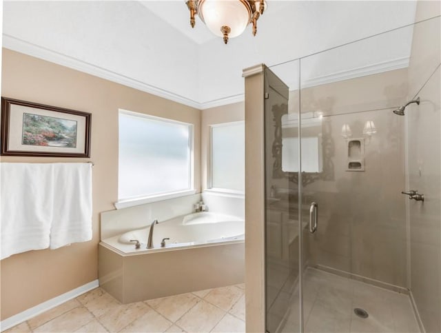 bathroom with a garden tub, ornamental molding, a shower stall, baseboards, and tile patterned floors