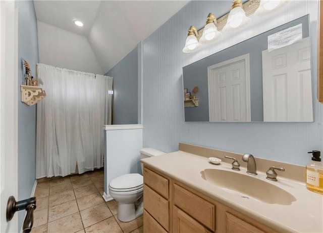 bathroom featuring curtained shower, lofted ceiling, toilet, vanity, and tile patterned flooring