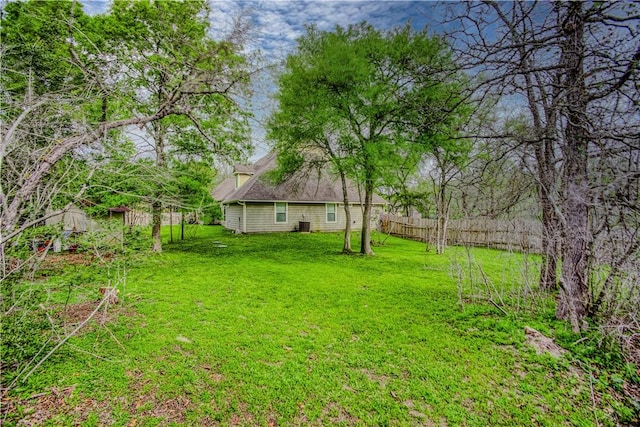 view of yard featuring fence